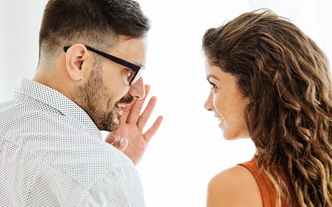 woman couple man happy love together gossip secret whispering ear couples therapy